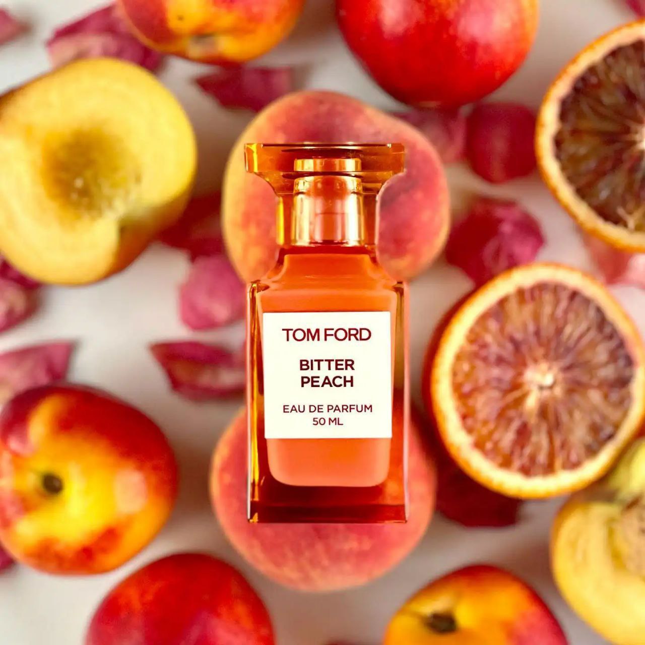 عطر ادکلن تام فورد بیتر پیچ ۱۰۰میل مناسب برای بانوان و آقایان با طبع ملایم